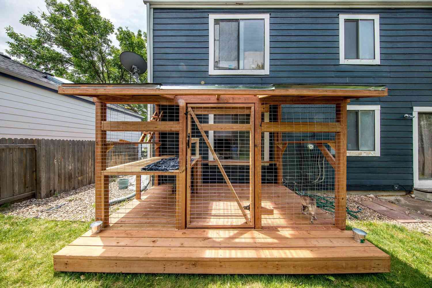 Backyard catio — cedar frame and wire mesh enclosure
