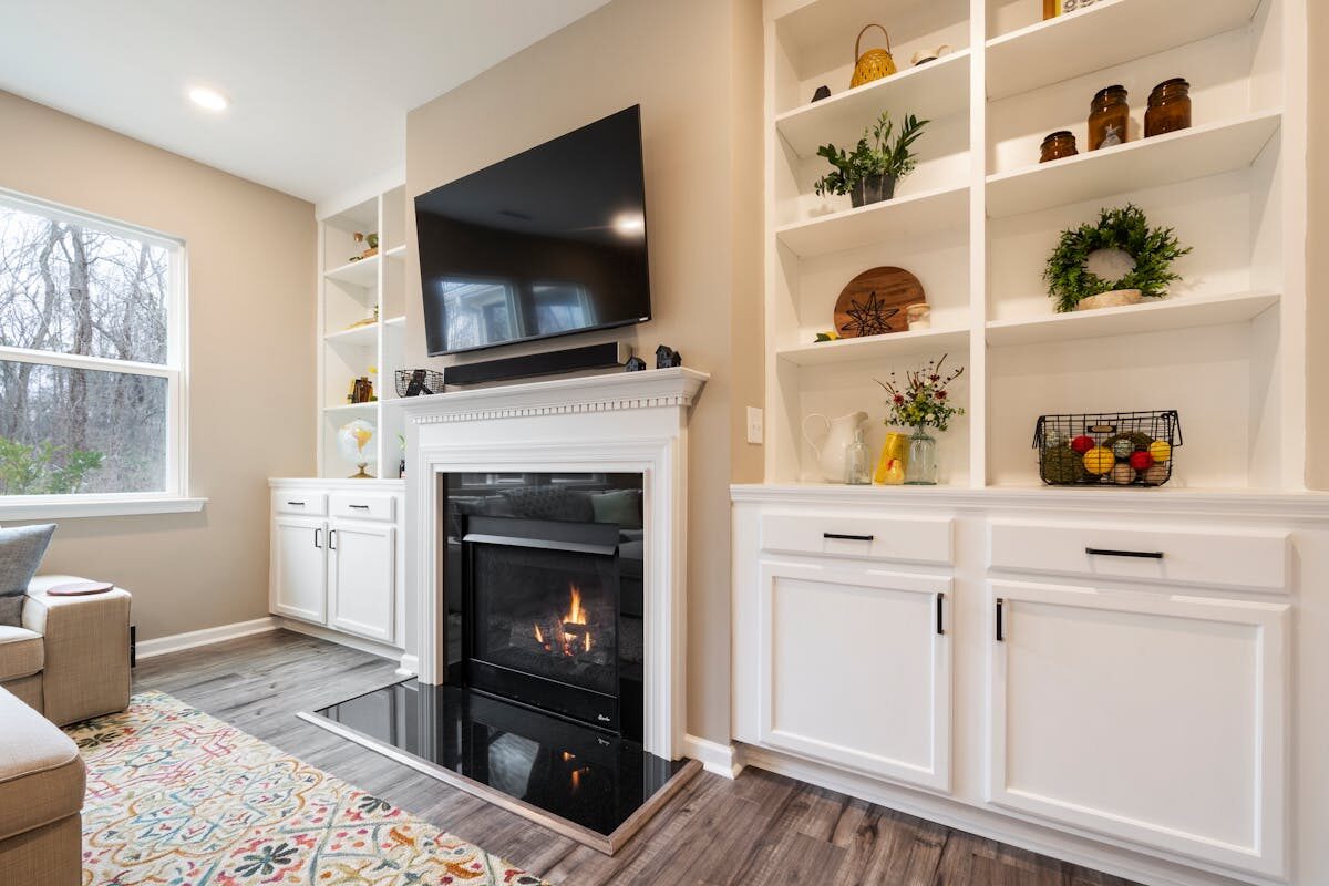 Built-in media wall with integrated storage and cable management