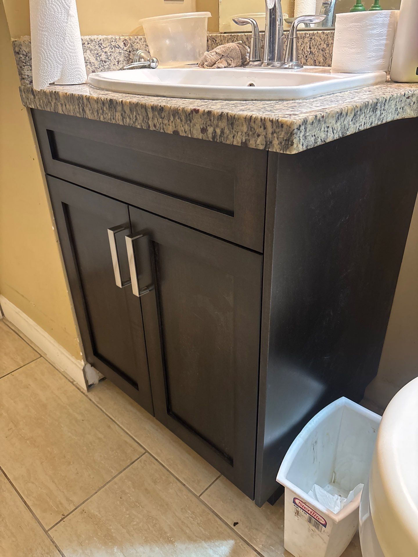 Dark espresso bathroom vanity replacement with granite countertop and chrome faucet — Pitt Meadows, BC
