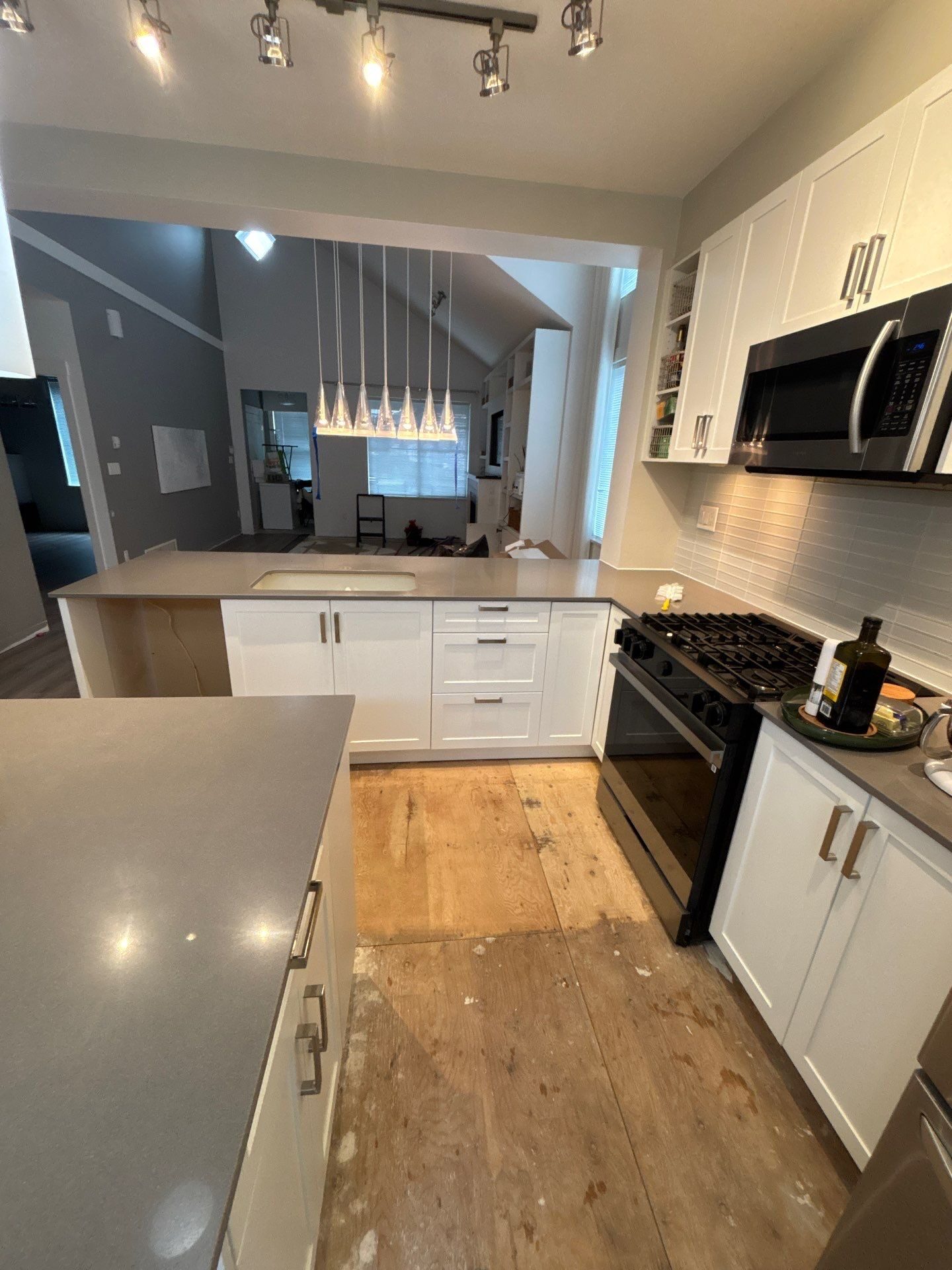 Rebuilt lower cabinet run matched to existing uppers — Surrey, BC